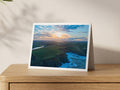 Premium A5 greeting card showing Newquay Airport and waterlogged fields beyond the north Cornwall cliffs at a winter sunrise