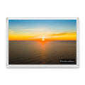 Porthcothan fridge magnet showing an orange and yellow sunset over open sea with The Quies rocks on the horizon
