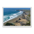 Bedruthan Steps fridge magnet showing the sea stacks at peak low tide surrounded by sand, with lines of swell beyond