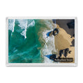 Bedruthan Steps fridge magnet showing a top-down view of waves crossing bands of blue water, sand and rock