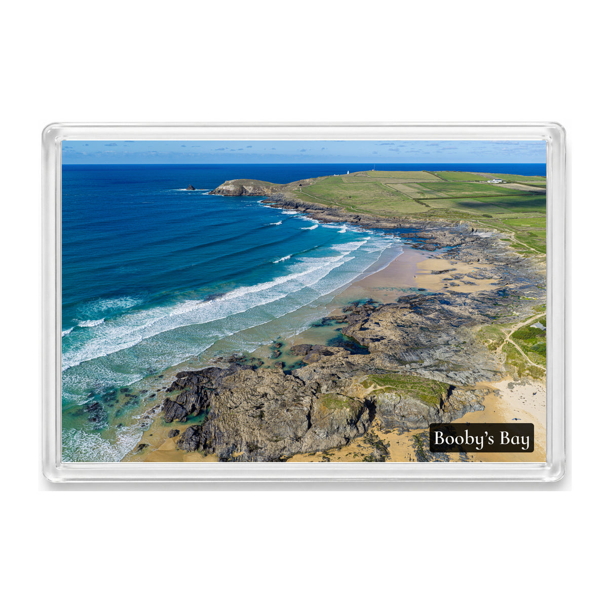 Booby’s Bay fridge magnet showing Atlantic swell, surfers in the line-up, rock pools and the Trevose Head lighthouse