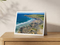 Premium A5 greeting card showing surf, rock pools and the Trevose Head lighthouse at Booby’s Bay