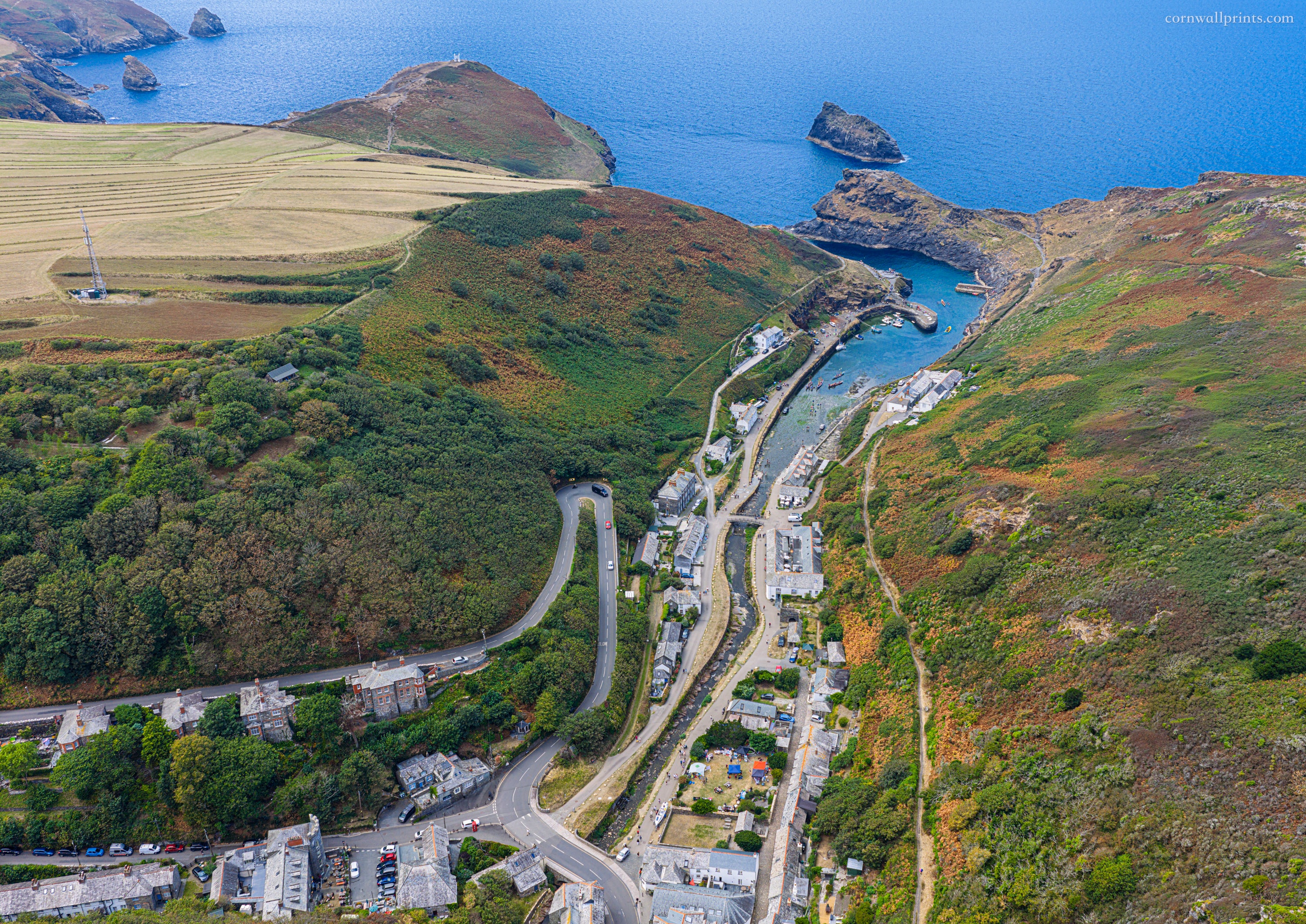 Aerial view along Boscastle’s Valency Valley towards the harbour, Forrabury Stitches and Atlantic