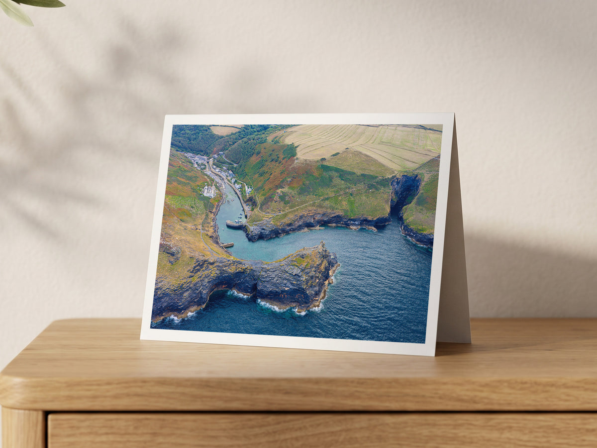 Premium A5 greeting card showing the winding inlet of Boscastle Harbour between dark cliffs and green headlands