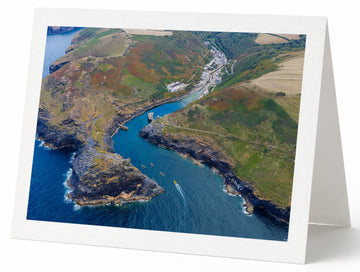 Premium A5 greeting card showing Boscastle harbour inlet, kayaks and village