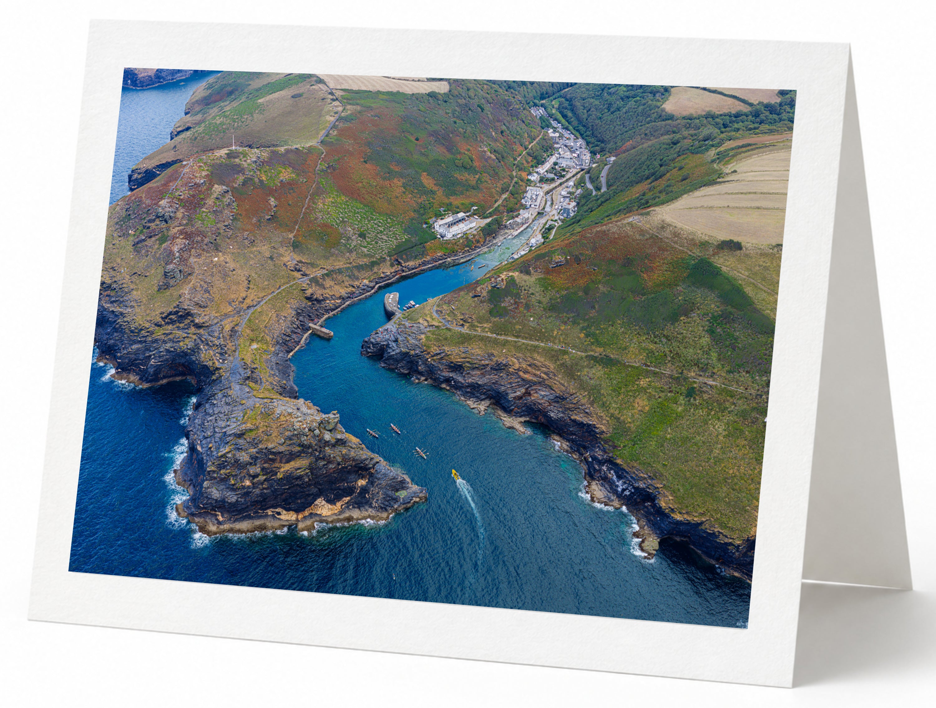 Premium A5 greeting card showing Boscastle harbour inlet, kayaks and village