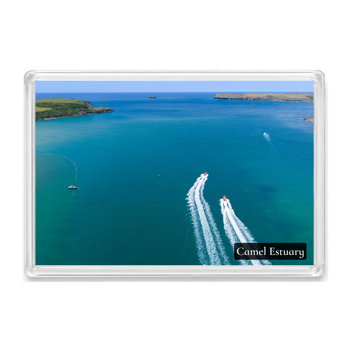 Camel Estuary fridge magnet showing two boats speeding side by side with bright wakes across clear blue water towards the Atlantic