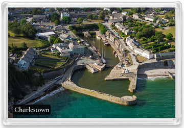 Charlestown fridge magnet showing tall ships and stone piers with muted harbour water contrasting against the turquoise sea