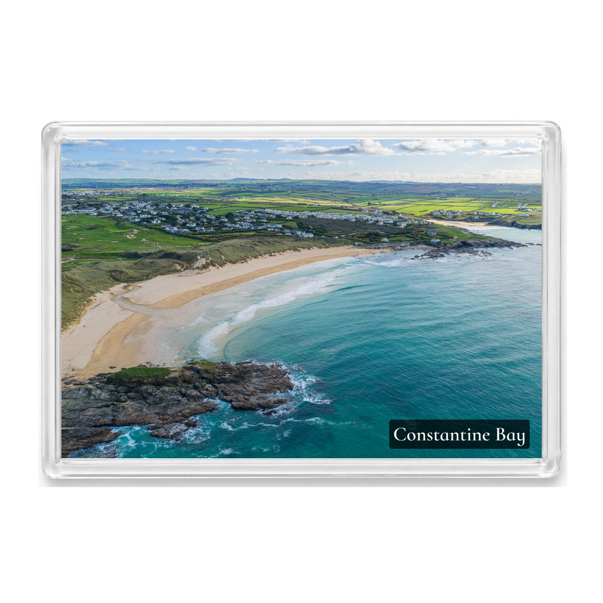 Constantine Bay fridge magnet showing the full sweep of the bay in clear daylight with Treyarnon Bay in the distance