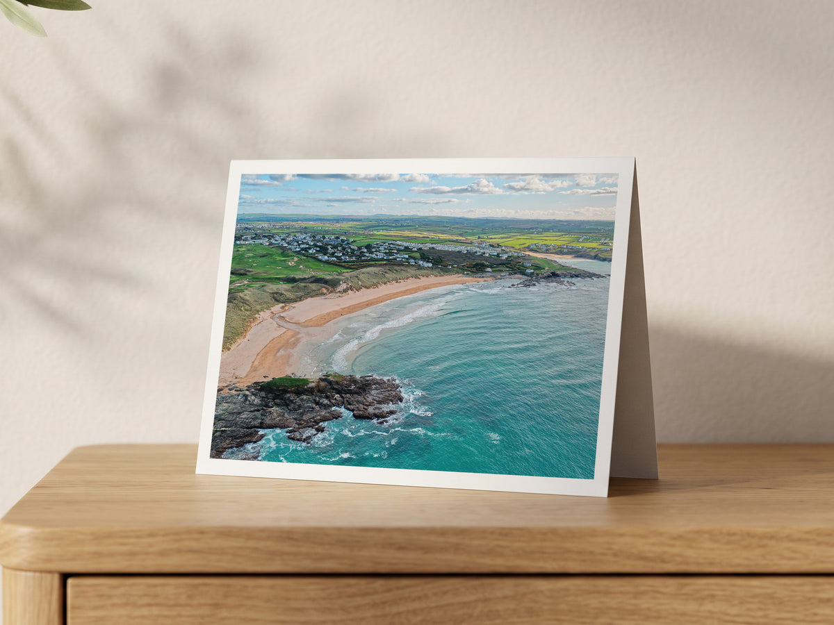 Premium A5 greeting card showing the curve of Constantine Bay in autumn daylight, with Treyarnon in the distance