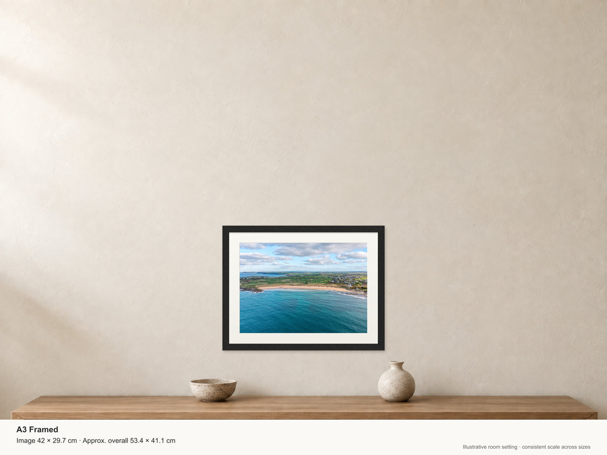 Constantine Bay to Pentire — A3 framed, 22mm black stained frame and 35mm mount. Illustrative room view and dimensions.