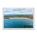 Constantine Bay fridge magnet showing the bay under blue sky and grey cloud with Trevone, Stepper Point and Pentire Point beyond