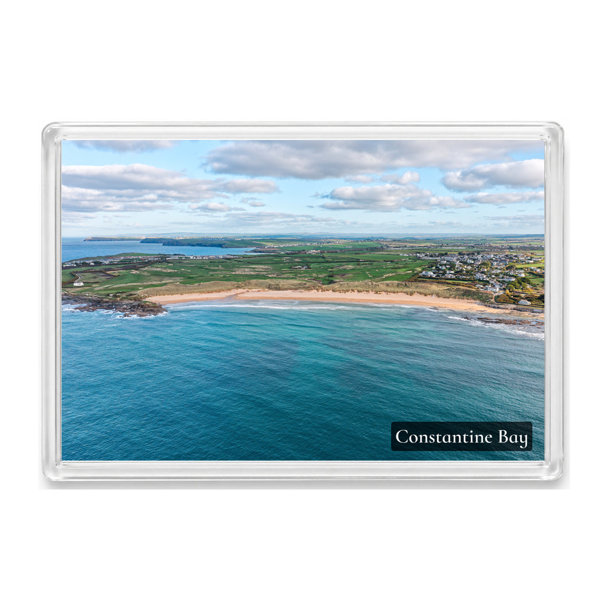 Constantine Bay fridge magnet showing the bay under blue sky and grey cloud with Trevone, Stepper Point and Pentire Point beyond