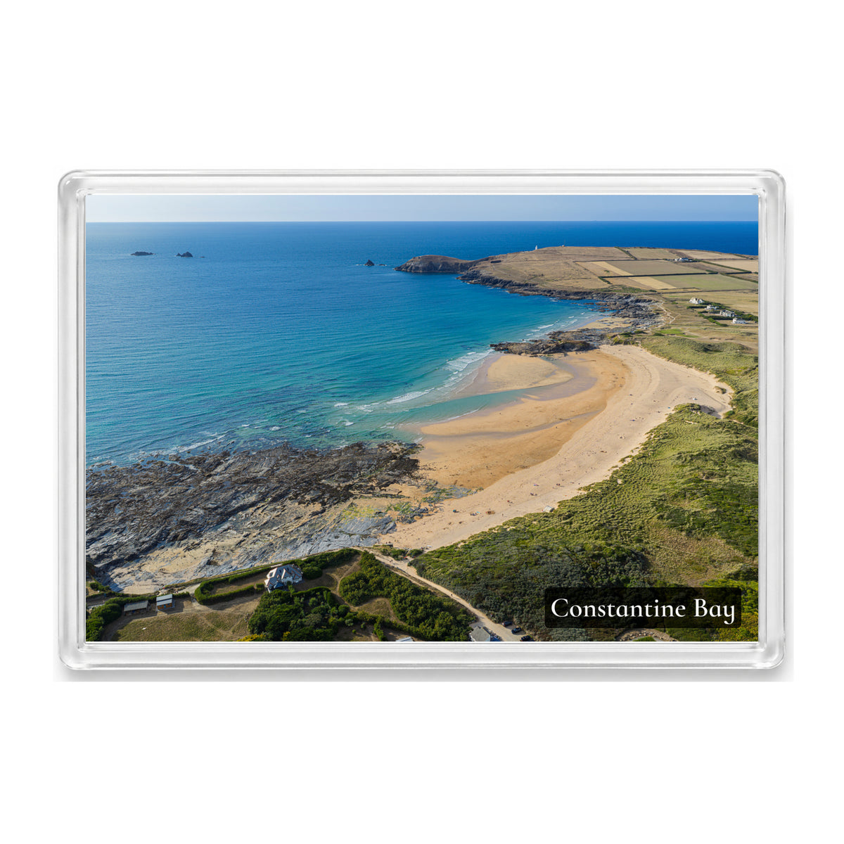 Constantine Bay fridge magnet showing sand, a tidal stream and turquoise water leading to Trevose Head in evening light