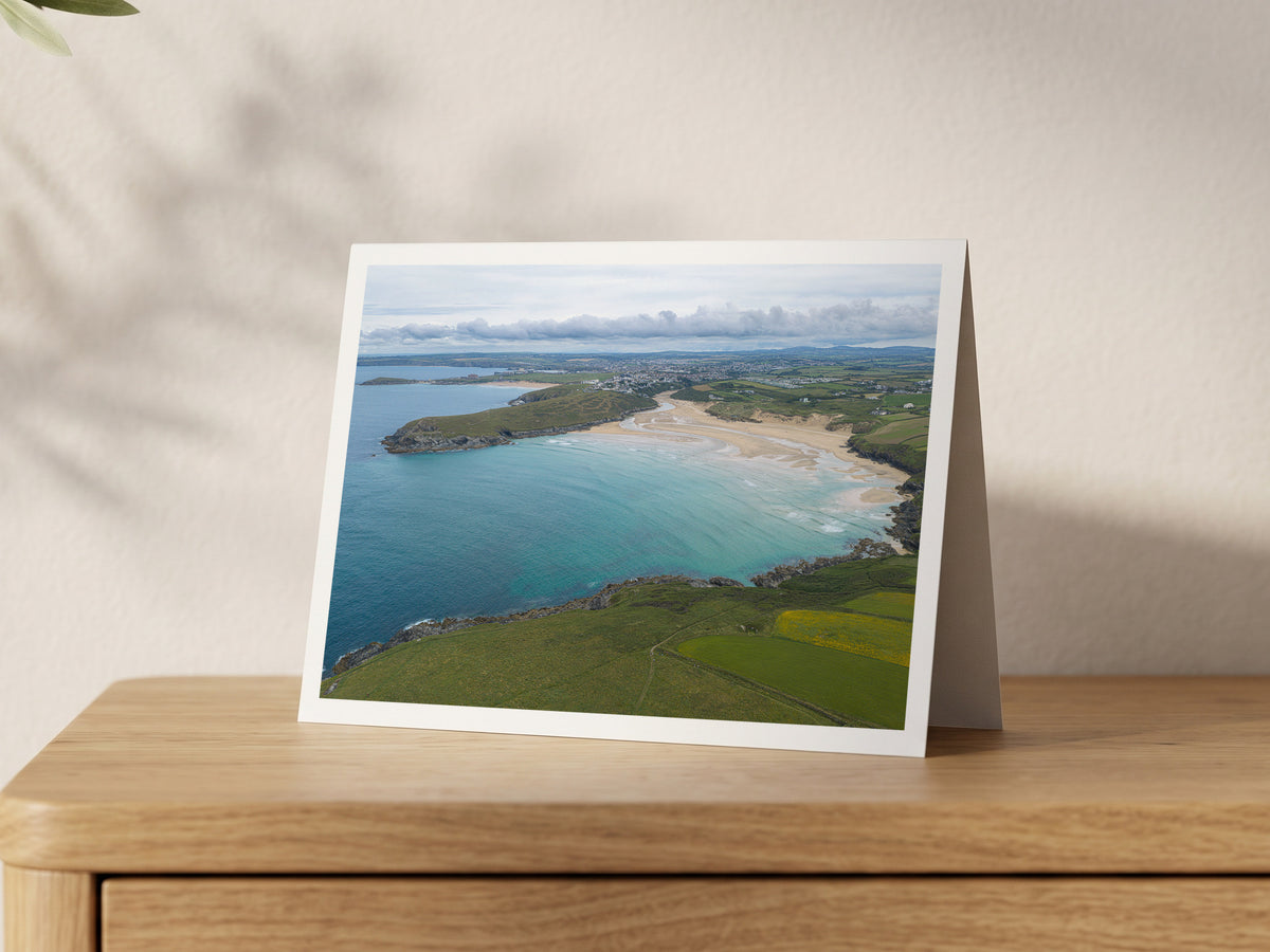 Premium A5 greeting card showing Crantock Bay from West Pentire, with the Gannel channels across the sand and Pentire Point East beyond