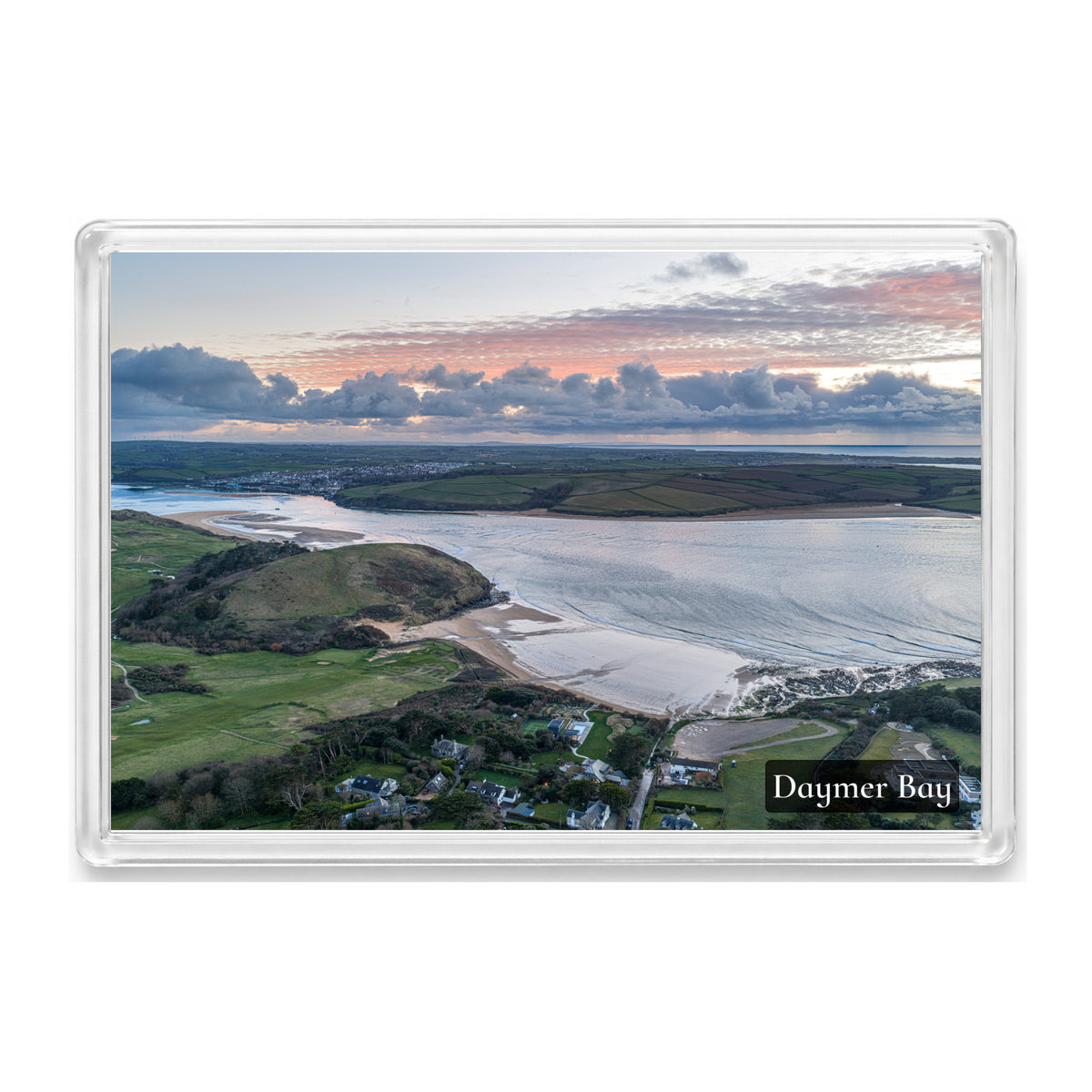Daymer Bay fridge magnet showing calm reflective estuary water at sunset beneath layered cloud, with Padstow in the distance