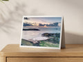 Premium A5 greeting card showing rain clouds and sunset over Stepper Point from Daymer Bay
