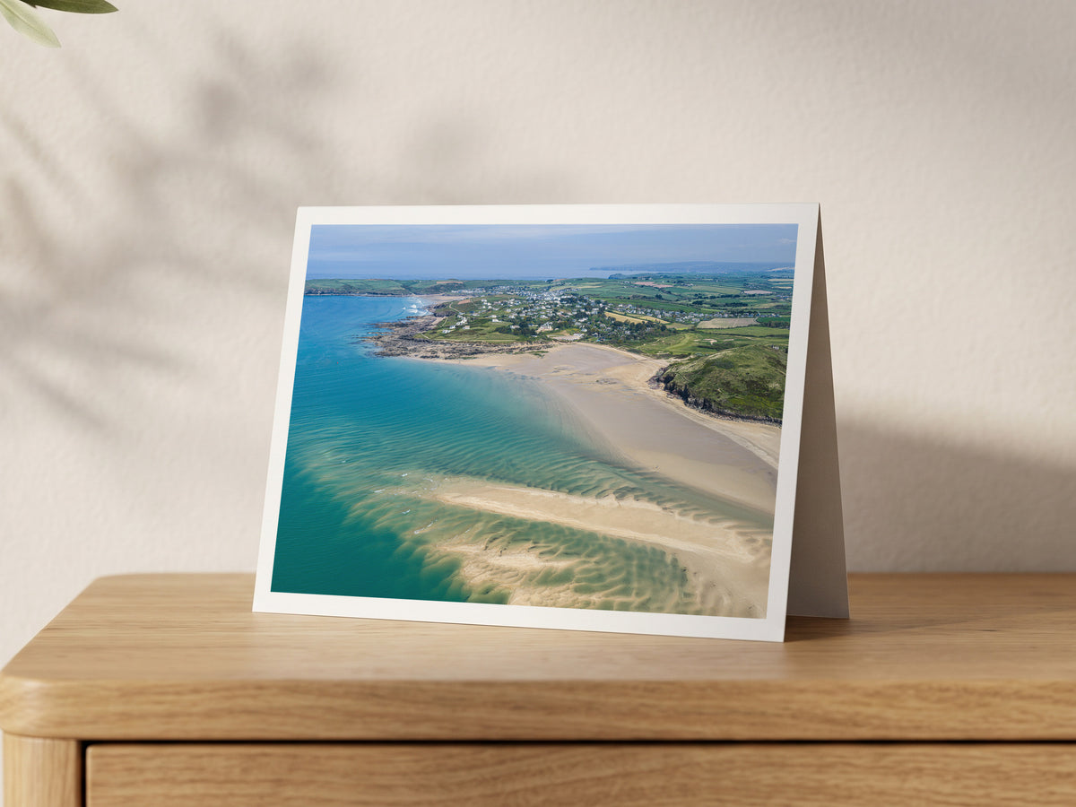 Premium A5 greeting card showing the Doom Bar sandbar at low tide with Polzeath beyond