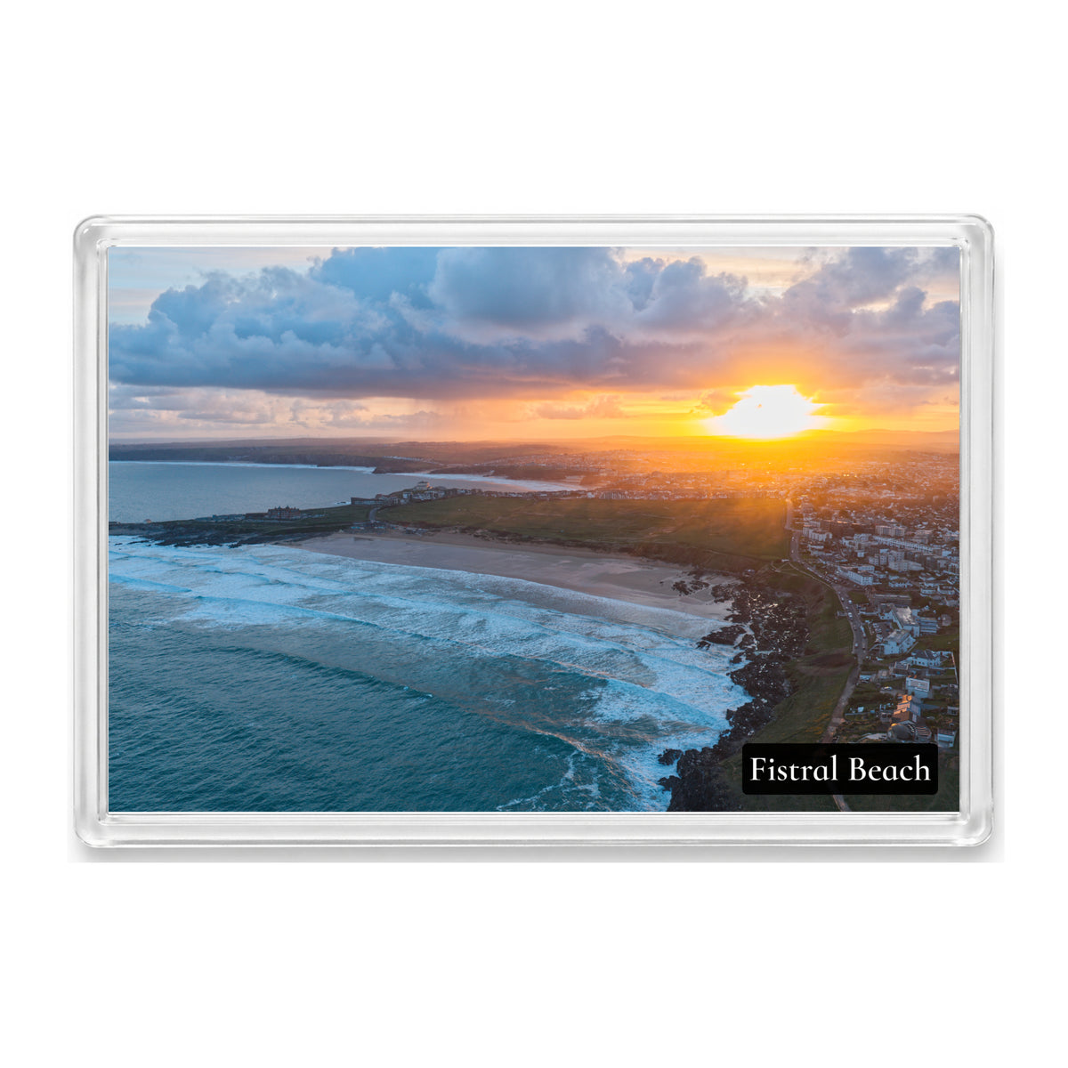 Fistral Beach fridge magnet showing lines of Atlantic surf at sunrise with the coast running north to Watergate Bay