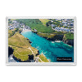 Port Gaverne fridge magnet showing the sheltered cove from the sea with gleaming shades of blue water on a sunny day