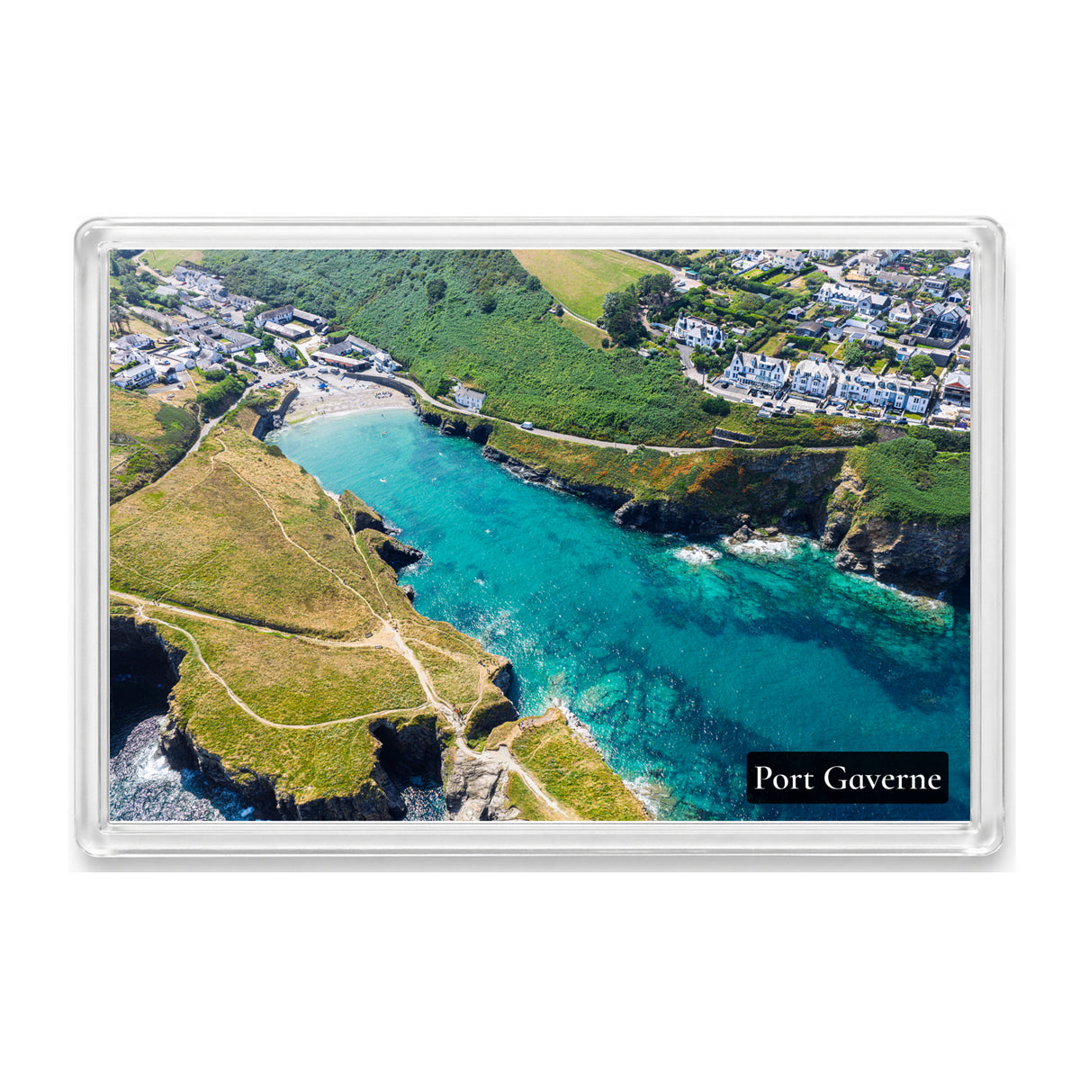Port Gaverne fridge magnet showing the sheltered cove from the sea with gleaming shades of blue water on a sunny day