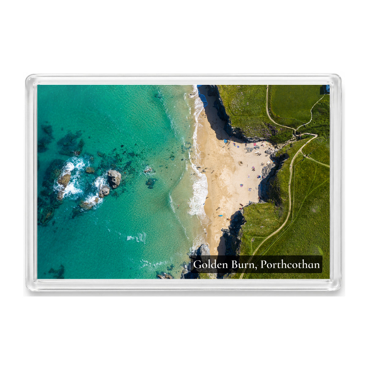 Golden Burn fridge magnet showing vivid turquoise water and shoreline shapes at Porthcothan Bay from directly above