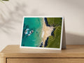 Premium A5 greeting card showing a top-down view of turquoise sea and sand at Golden Burn, Porthcothan