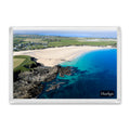 Harlyn Bay fridge magnet showing the east end of the beach at low tide with calm, vividly coloured sea
