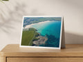 Premium A5 greeting card showing clear turquoise water and submerged rocks at Harlyn Bay from the Trevone side