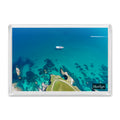 Harlyn fridge magnet showing a small ferry crossing flat, clear, richly coloured water just offshore from Harlyn Bay