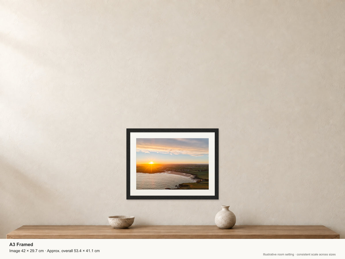 Sunrays Over Harlyn Bay — A3 framed, 22mm black stained frame and 35mm mount. Illustrative room view and dimensions.