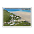 Hawker’s Cove fridge magnet showing blue and green low-tide channels and sandbars with Polzeath in the distance