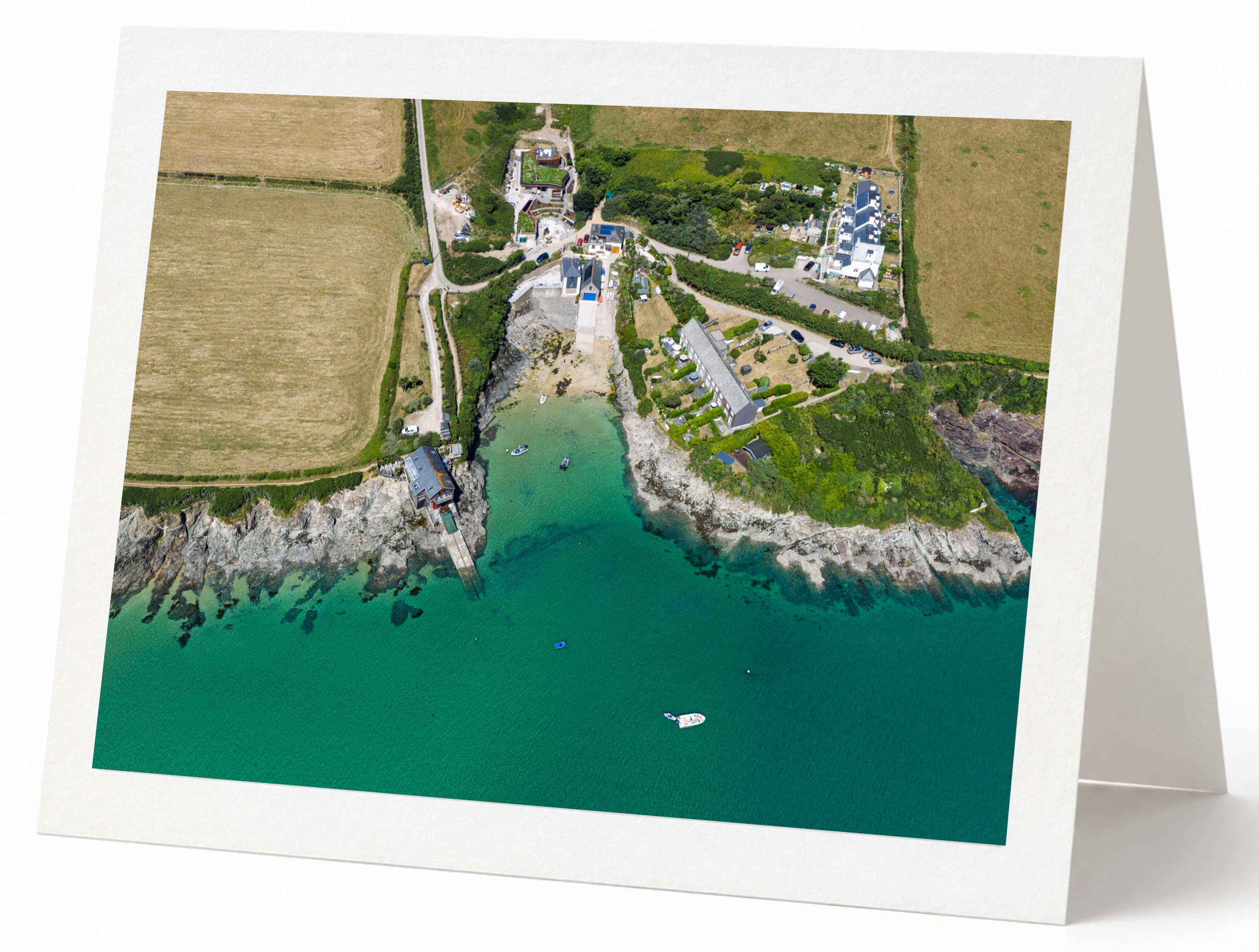 Premium A5 greeting card showing Hawker’s Cove at high tide with a single boat