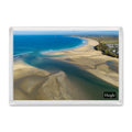 Hayle Estuary sandbanks and clean autumn surf towards Gwithian and Godrevy Lighthouse, shown in a clear acrylic fridge magnet with a Hayle label