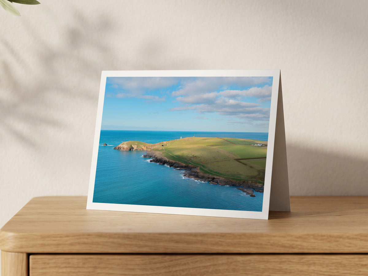 Premium A5 greeting card showing Trevose Head Lighthouse on its green headland above a calm Atlantic