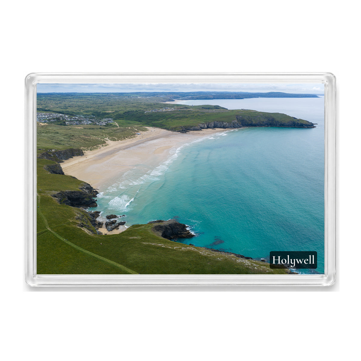 Holywell fridge magnet showing Holywell Bay’s beach and summer blue sea with the coast stretching south to Perranporth