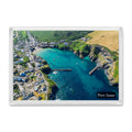 Port Isaac fridge magnet showing the harbour at high tide enclosed by the village’s tightly packed buildings