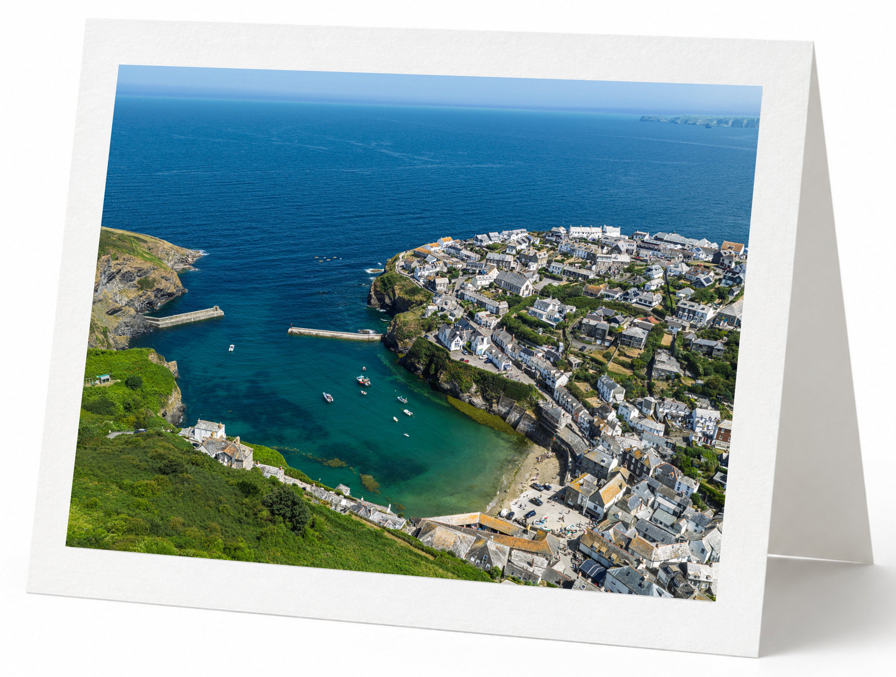 Premium A5 greeting card showing Port Isaac harbour and village at high tide