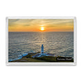 Trevose Head fridge magnet showing the lighthouse centred against a golden sunset with the softened coastline beyond