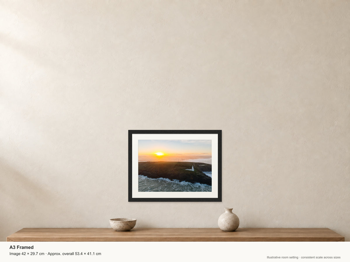 Trevose Head Lighthouse — West View in Sea Mist — A3 framed, 22mm black stained frame and 35mm mount. Illustrative room view and dimensions.