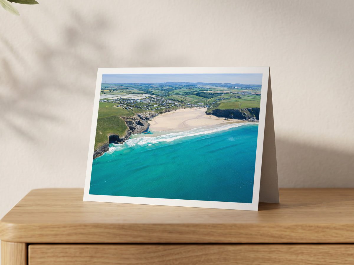 Premium A5 greeting card showing Mawgan Porth head on from the sea with turquoise shallows