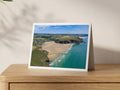 Premium A5 greeting card showing Mawgan Porth at low tide with blue sea and Watergate Bay beyond