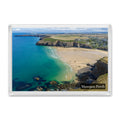 Mawgan Porth fridge magnet showing emerald and turquoise shallows, dark reefs and golden sand beneath the cliffs and village