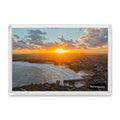 Newquay fridge magnet showing sunrise behind the town with Towan, Great Western, Tolcarne and Lusty Glaze beaches and the harbour