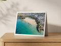 Premium A5 greeting card showing Tolcarne Beach in Newquay with turquoise water and beach huts