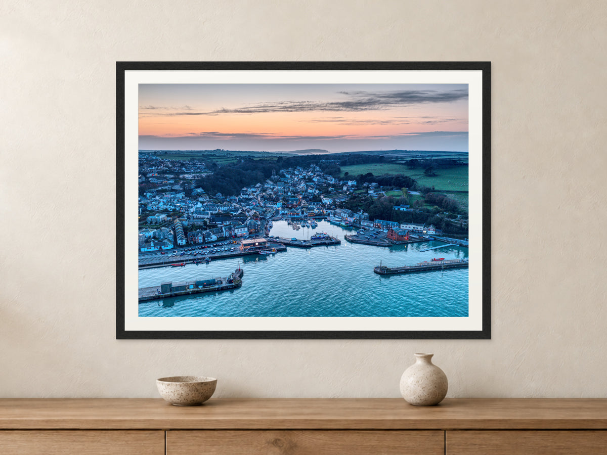 Padstow harbour at sunset in a black frame