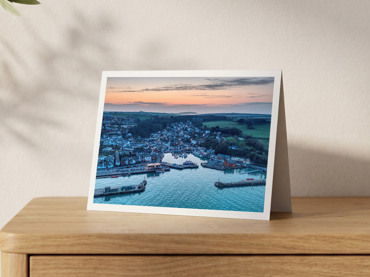 Premium A5 greeting card showing Padstow harbour at dusk with Trevose Head on the horizon