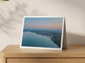 Premium A5 greeting card showing the calm Camel Estuary and Padstow at sunset