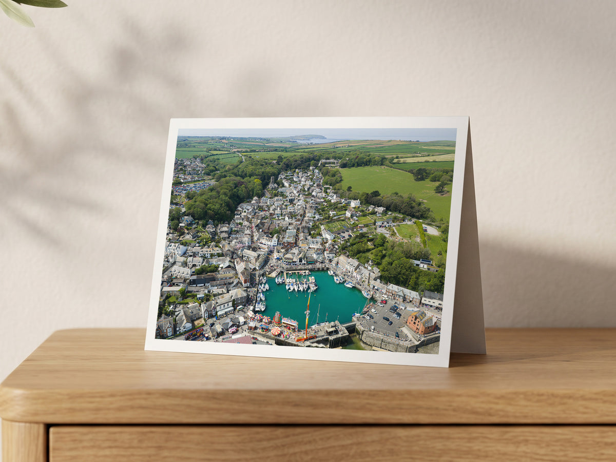 Premium A5 greeting card showing Padstow harbour during May Day celebrations
