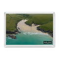 Polly Joke fridge magnet showing the curved cove, pale sand and clear blue-green water, with no sky in view